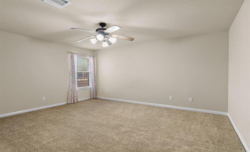 Each room includes a ceiling fan, ample sized closet and carpet flooring