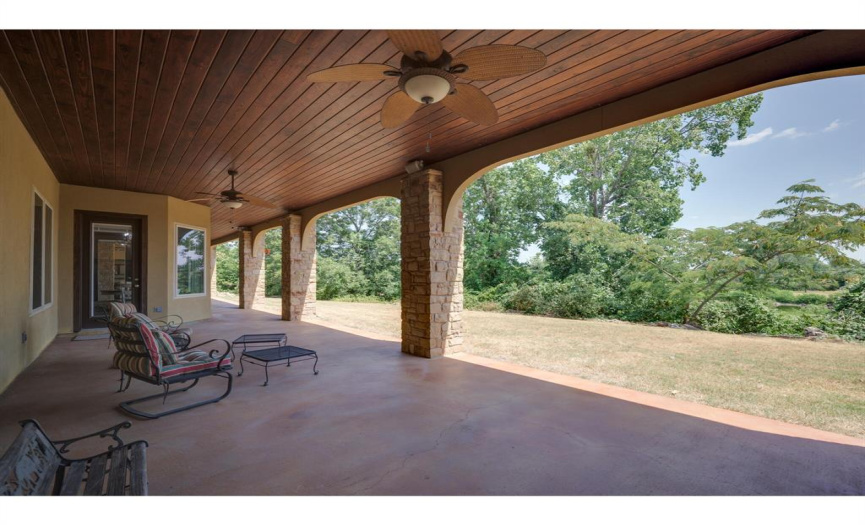 Step outside onto the massive covered back patio, designed for relaxation and entertainment