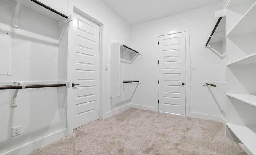 Large laundry room with extra storage