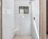 Walk in tile shower with large rainmaker head