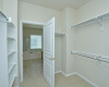A secondary view showing how large the primary closet is.