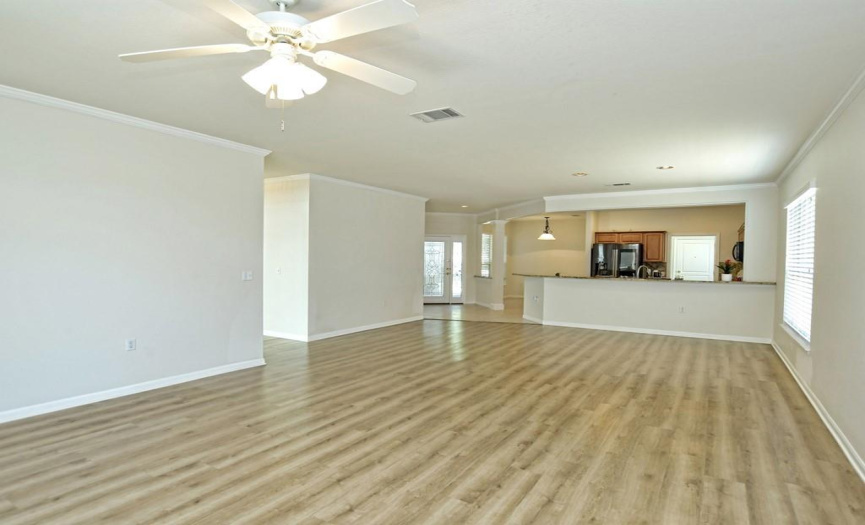 Living and Formal Dining area showing you the open concept home.
