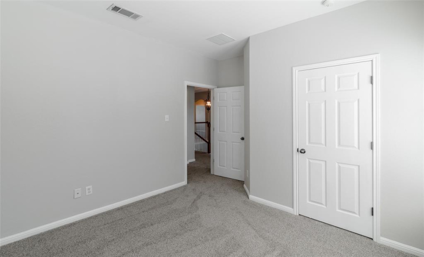 Bedroom 3 has a two-inch blinds, a standard closet, a ceiling light, and measures approximately 10 x11.