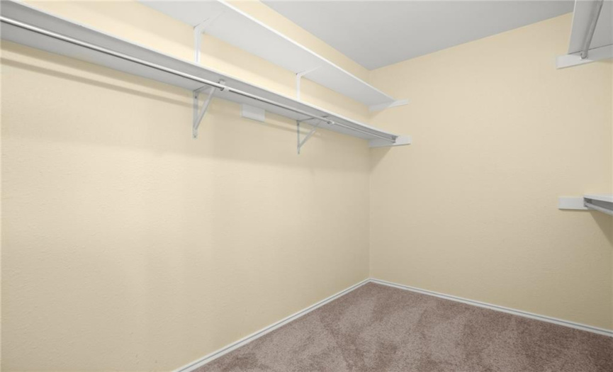 The walk-in closet has a great storage system for your clothing and accessories.