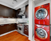 A laundry closet provides space for your stackable washer and dryer, making daily tasks a breeze