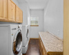 Laundry room and folding table with plenty of room for inventory storage and more.