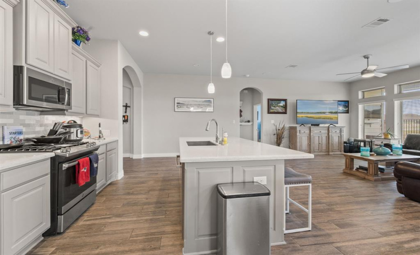 Featuring sleek granite countertops, SS appliances, and bountiful counter space.