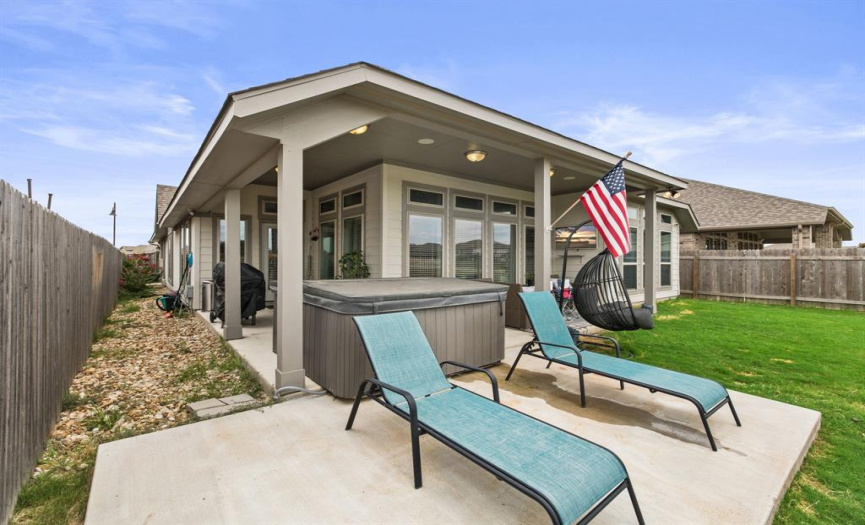 Amazing entertainer's wrap-around, covered back porch with space for a hot tub plus an extended al fresco patio. 