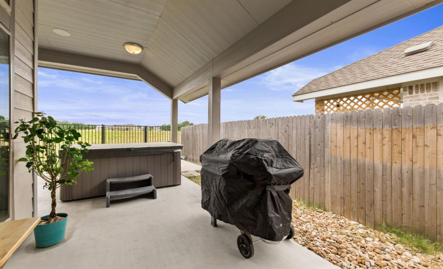 This wrap-around, covered porch offers an abundance of space for you to configure your ideal outdoor living dining, and entertaining space. 