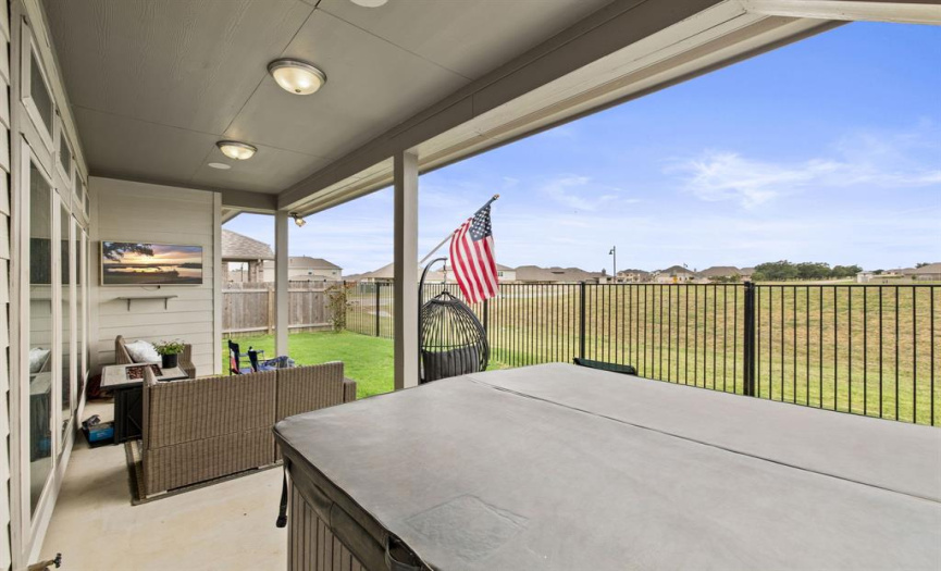 Imagine kicking back, relaxing, and enjoying the peaceful community greenbelt views behind the home. The grassy knoll gives your outdoor oasis great privacy.