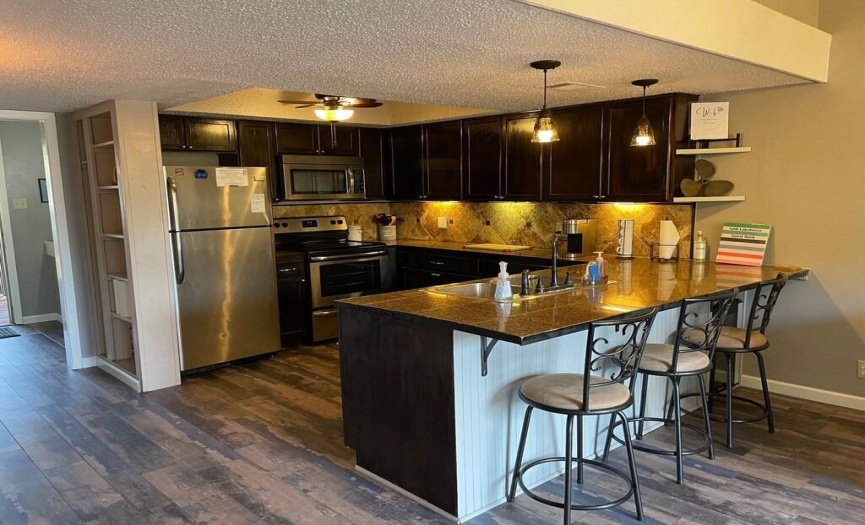 Great kitchen with Granite Tile Counter and Stainless Steel appliances
