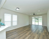 Living room with luxury vinyl plank flooring.