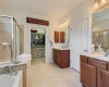 Owner's suite bathroom with dual vanities