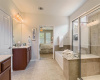 Owner's suite has a walk in shower and soaking tub