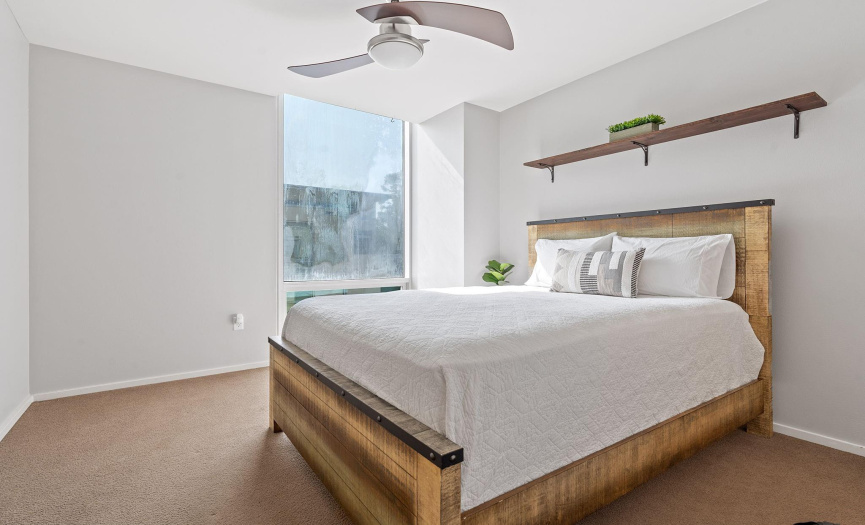 The condo features a well-appointed guest bedroom and bathroom, perfect for accommodating visitors or creating a home office space. *fogged window glass was replaced 8/30/23*