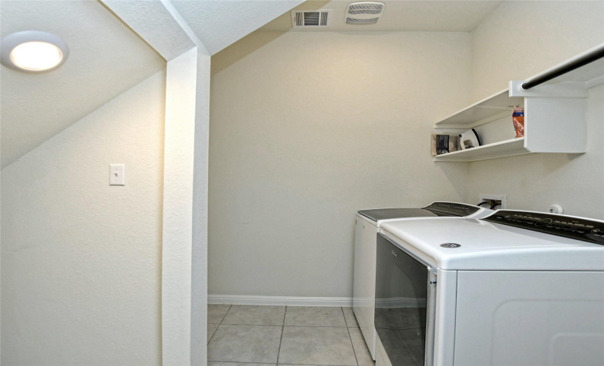 Large laundry room with space for 2nd refrigerator or freezer