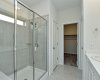 Primary bathroom with Large walk-in shower and closet