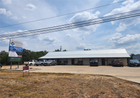 Three unit Office Building faces Highway 290. 100% Leased.