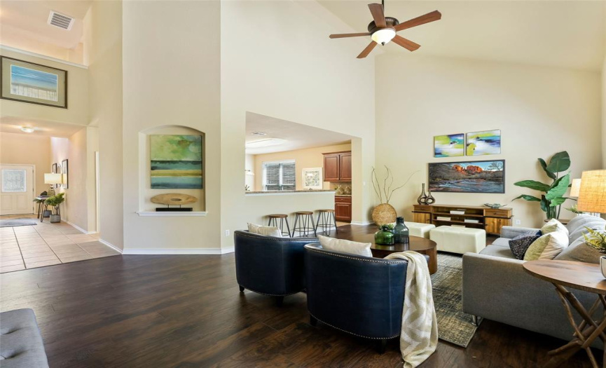 Family gatherings are made simple, with open-concept spaces connecting the kitchen, dining area, and family room