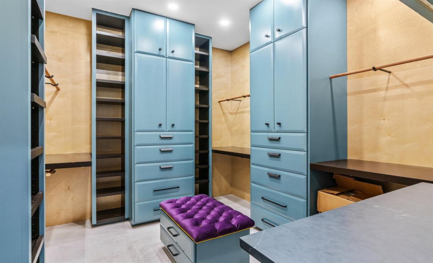 Custom-built closet with ceiling high storage and tons of space!