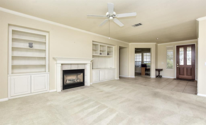 Great room with built-ins and gas fireplace