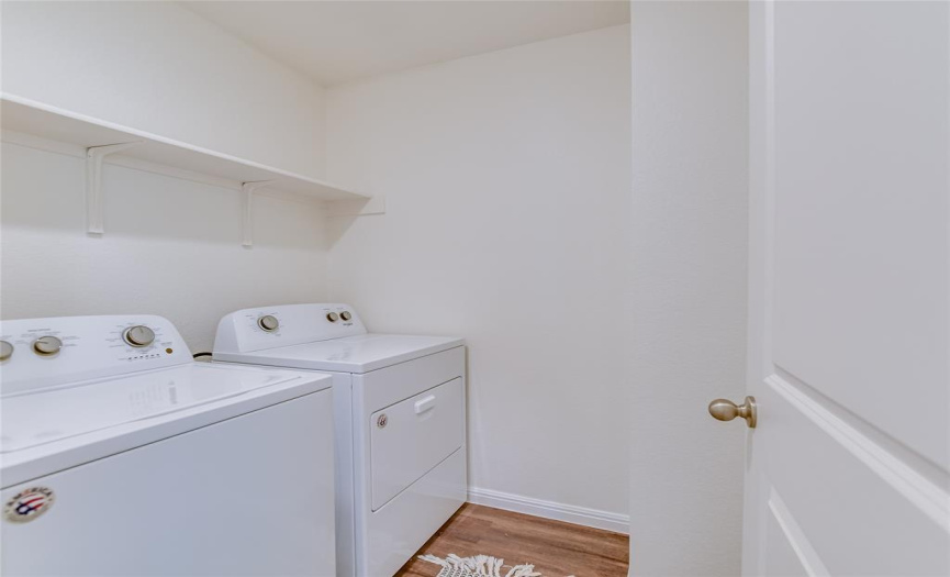 Upstairs Laundry Room: This convenient location saves both time and unnecessary steps with all the bedrooms upstairs.