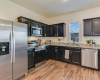 Stainless steel appliances, built-in-in microwave, undermount double sink, lots of counter, cabinet and drawer space for all those important and 