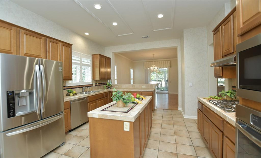 The island kitchen is one of the most appreciated features making this home such a favorite.