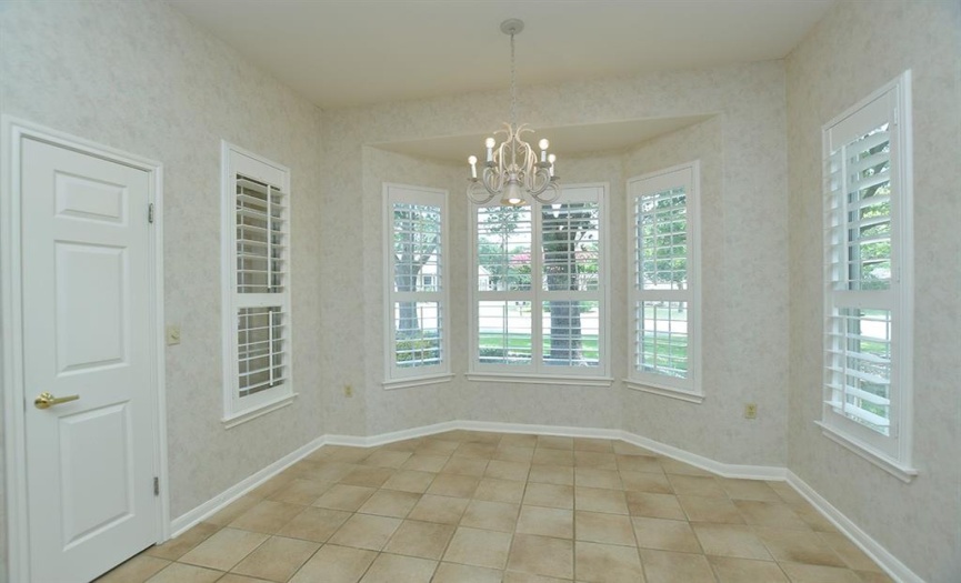 Another of the favorite features of the Trinity plan is its bay-windowed breakfast nook looking out front. Large plantation shutters are an extra plus here and throughout the home.