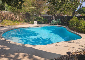 THIS IS HOW YOU SURVIVE THE TEXAS HEAT!  POOL REPLASTERED 2020. THIS YARD IS AMAZING AND WILL BE AGAIN AFTER THIS DROUGHT--IN THE BACKGROUND IS A LARGE POND! LOTS OF XERISCAPING....