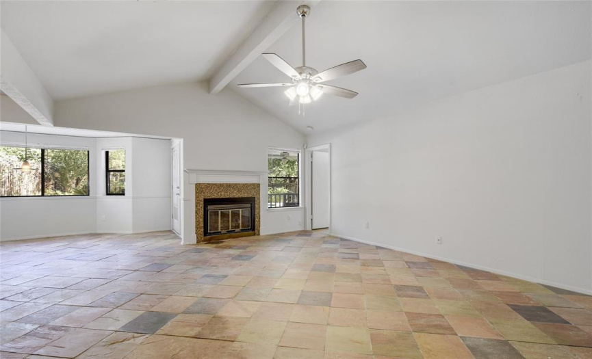FIREPLACE, DINING IS OPEN TO LIVING, KITCHEN AROUND THE CORNER TO LEFT.  DOOR TO RIGHT HEADS INTO PRIMARY SUITE OVERLOOKING POOL!