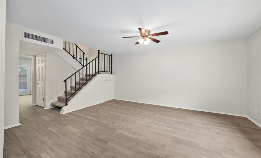 Storage matters, and this townhome makes efficient use of space.  Not only is there an entry closet by the front door, but there is additional storage tucked under the stairs.  