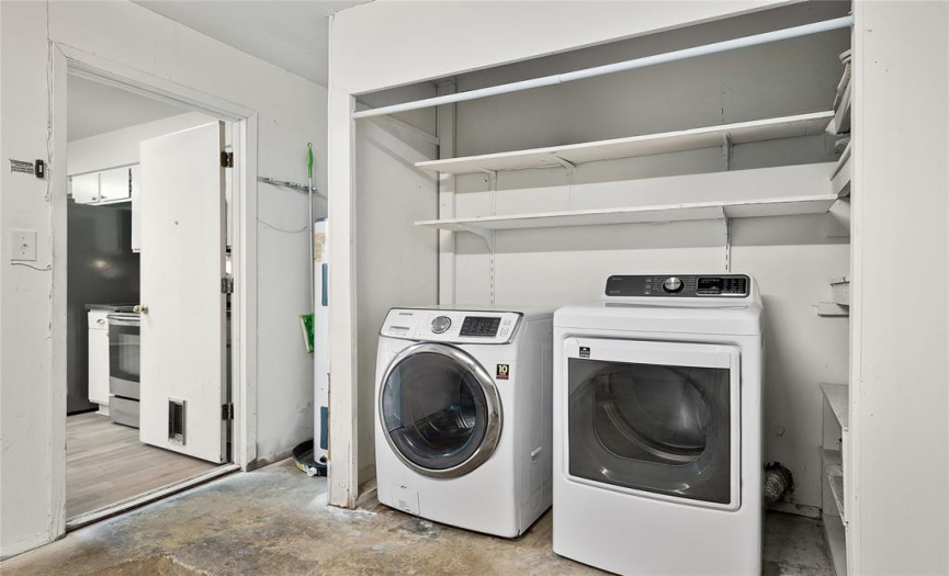 The one-car garage also includes built-in shelves and a dedicated laundry area.