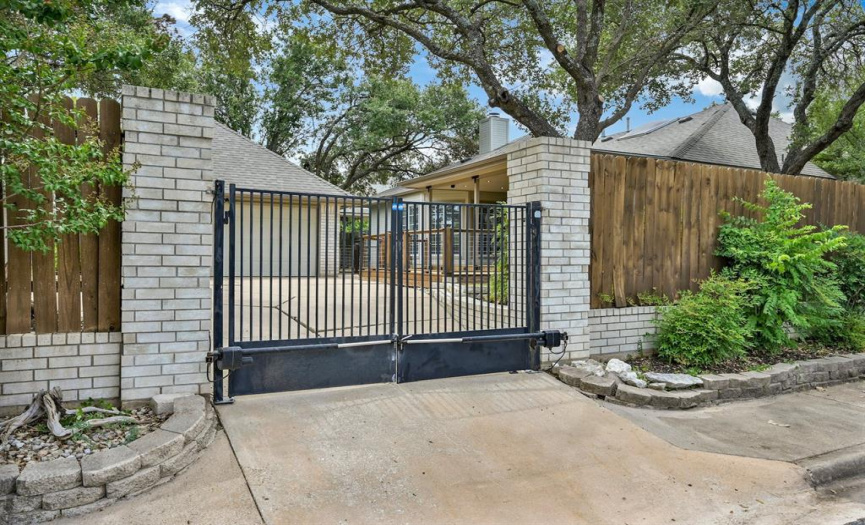 Unique Side entry gate to garage and yard. 