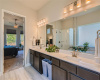 With double vanities, the primary bath provides ample space.