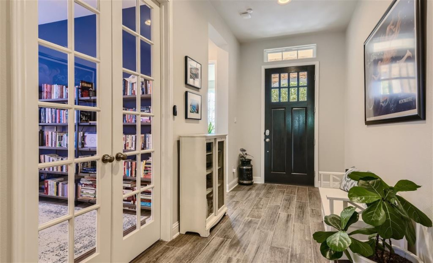 A dedicated office with French doors is among the rooms toward the front of the house on the first floor.