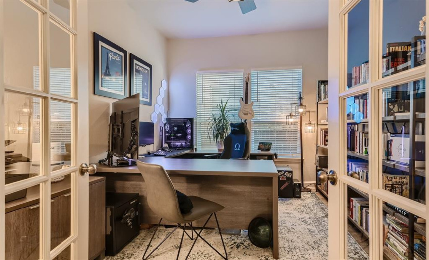The office provides plenty of room for a desk and bookshelves.