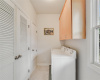 Nice laundry room with lots of storage 