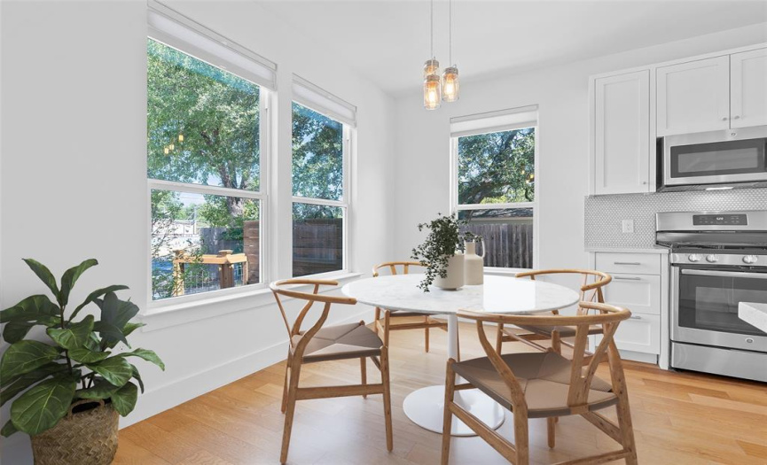 The dining area provides lovely views of the landscaped front yard. *Virtually staged to show layout possibilities.