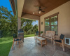 Enjoy the Texas winters and summers under the shade of the rear patio that overlooks the bubbling stream.