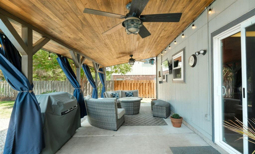 Covered rear deck with Cedar ceiling and fan