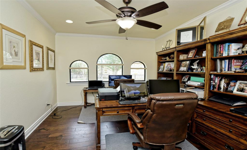 Handsome dedicated study. French doors offer privacy. 