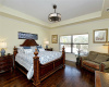 Master Bedroom with tray ceiling and with room for a sitting area.