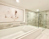 Primary bathroom with soaking tub and separate shower 