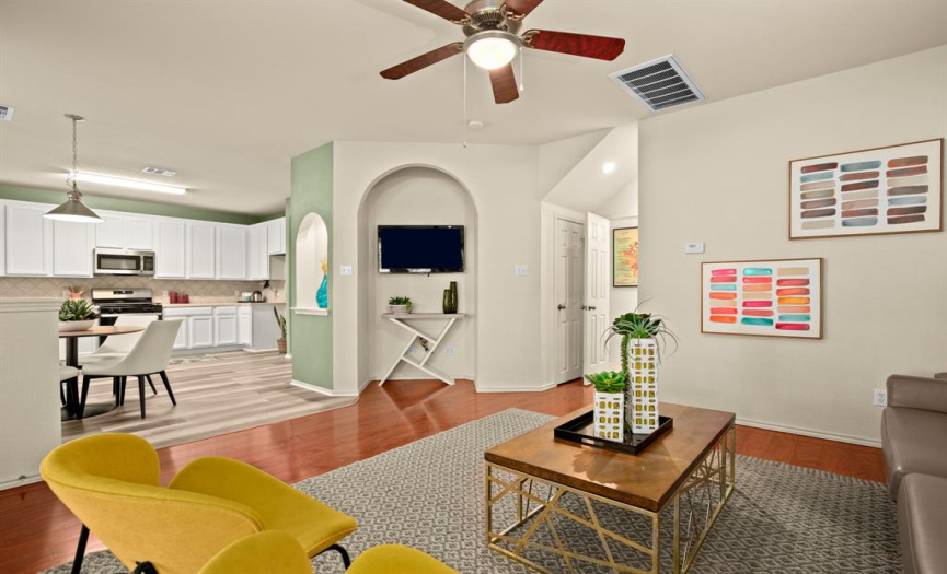 Easily stay connected with friends and family while preparing meals in the kitchen with this beautiful open floor plan. Arching nooks provide space to showcase your favorite art & collectibles. 