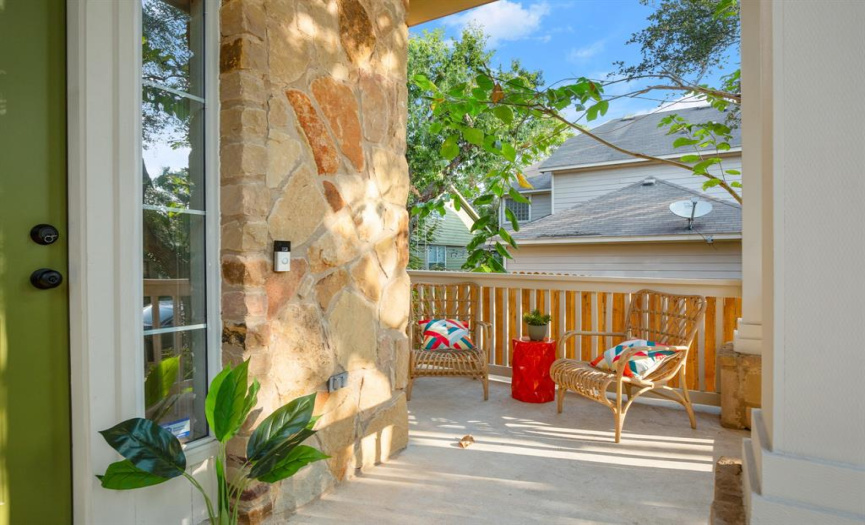 The welcoming front porch is perfect for a porch swing or rocking chairs where you can enjoy your favorite iced cold beverage and watch the world go by. 