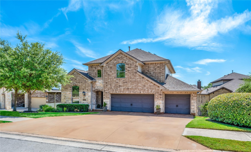 Welcome home to 5305 Green Thread Trail with impressive brick and stone exterior and pristinely manicured landscaping.