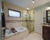 Enjoy the spa like soaking tub and walk in tiled shower.