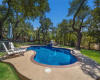 Enjoy the private backyard with sparkling pool and spa