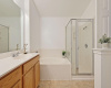 Enjoy a relaxing deep soaking tub and a separate walk in shower.